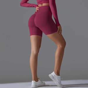 Detail of high-waist seamless compression shorts showing peach lift and body contouring