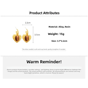 Detailed view of heart-shaped earrings with brown resin stone and size specifications