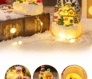 Macro detail of hand-painted resin Christmas house with LED glowing function
