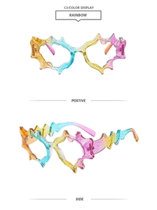 Macro detail of rainbow glitter heart-shaped sunglasses with fluid liquid design