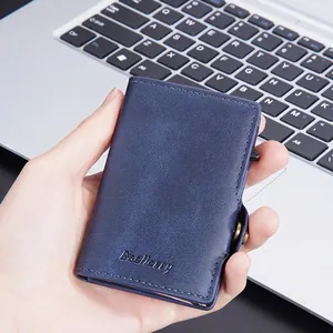 Men's blue leather RFID blocking wallet with pop-up card mechanism and secure buckle closure