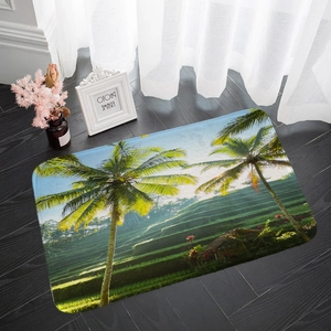 Detail of tropical landscape bath mat with coconut trees on dark wooden floor