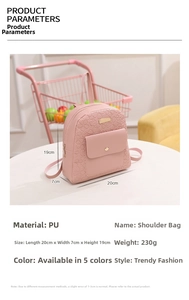 Pink PU leather school backpack featuring floral heart embossing and gold lock detail
