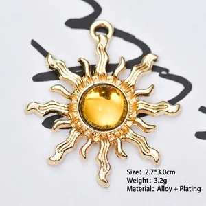 Baroque sun flower pendant in golden alloy with yellow transparent stone 2.7x3.0cm