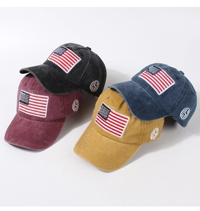 Detailed corduroy texture and USA flag embroidery on stacked vintage baseball caps
