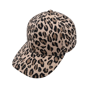 Detailed view of leopard print texture and six-panel stitching on baseball cap