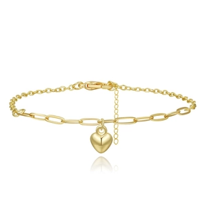 Detail of gold chain bracelet featuring a polished heart charm and lobster clasp