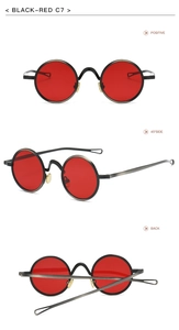 Detailansicht der runden Punk-Sonnenbrille mit schwarzem Metallrahmen und roten Gläsern