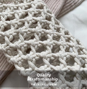 Macro shot of beige cotton rope woven mesh texture with soft pink fabric lining