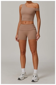Ensemble de fitness deux pièces avec haut asymétrique à une épaule et short taille haute