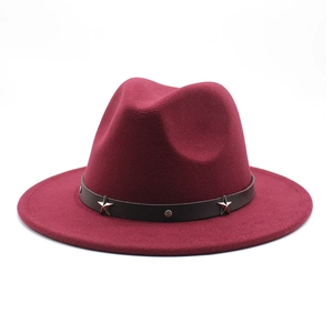 Detail of burgundy wool fedora hat with black leather band and silver star studs