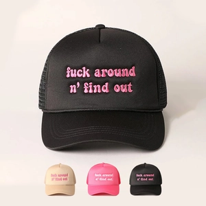 Detailed embroidery of text on breathable mesh foam trucker hat with adjustable strap