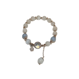 Elegant beaded bracelet with opal stones, zircon star charms, and silver accents