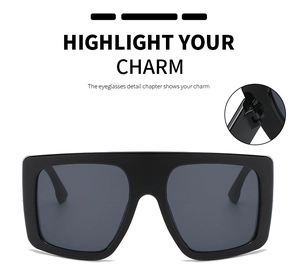 Close-up showing the reinforced metal hinge structure of oversized square sunglasses