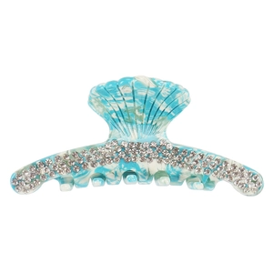 Macro view of blue marble shell hair claw clip with sparkly rhinestones detailing