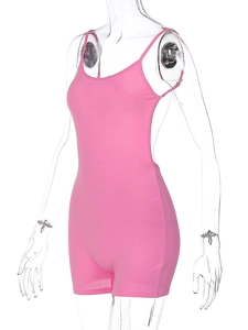 Side view of pink backless bodycon romper with thin straps on a clear mannequin