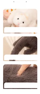 Close-up of the soft faux fur texture and neat stitching on the white ferret plush toy