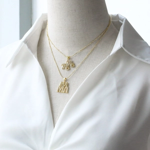 Gold-plated MAMA and mMe pendant necklaces with zircon inlay for women worn together