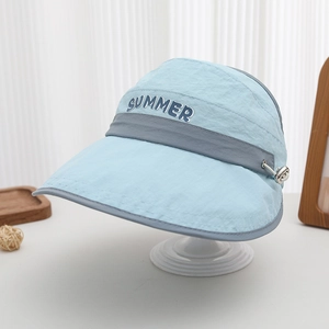 Detail of blue sun visor hat featuring Summer lettering and adjustable metal buckle