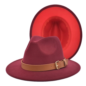 Two-tone burgundy and red wide brim fedora hat with brown leather belt and gold buckle