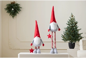 Detailed view of large and small Christmas gnomes with telescopic legs and red star ornaments