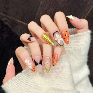 Handcrafted 3D floral beach wave press-on nails with gold chrome and polka dot art