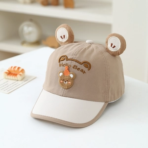 Detail of baby baseball cap featuring cute 3D bear ears and Hello Bear embroidery