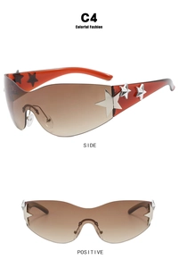 Detail view of red Y2K oversized sunglasses with silver star studs and gradient lenses