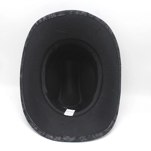 Interior view of black polyester cowboy hat showing texture and care label detail