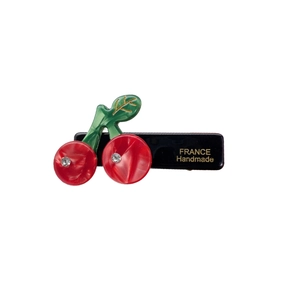 Cute cherry hair clip with red rhinestones and green leaves on a black handmade base