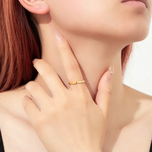 Elegant gold S925 sterling silver ring with delicate pave diamonds on model hand