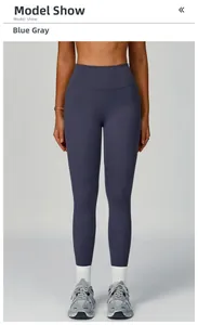 Front view of blue-gray high-waisted fitness leggings showing elastic texture and fit