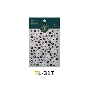 Macro detail of TL-317 floral nail art stickers with 3D white pearls and flower patterns