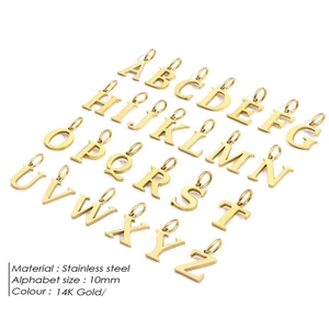 Grid layout of 14K gold-plated stainless steel hollow heart alphabet pendants for DIY jewelry