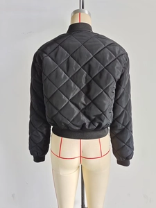 Rear view of black quilted bomber jacket with diamond pattern and ribbed hem on a mannequin