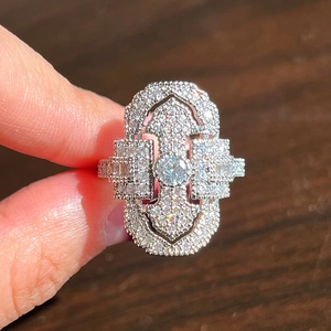 Vintage Art Deco hollow ring with silver metal and sparkling cubic zirconia crystals