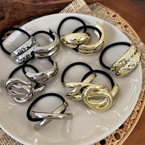 Minimalist geometric metal hair ties in gold and silver finish with high elastic bands