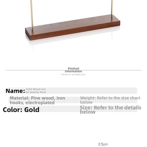 Detail of pine wood base and gold-plated metal frame on minimalist jewelry display stand