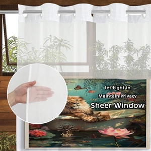 Detailed view of semi-transparent sheer curtain with lion art print and grommet top design
