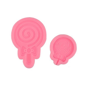 Pink silicone lollipop cake molds with bow details for DIY chocolate and crafts
