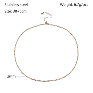 Macro detail of 2mm 18K gold-plated stainless steel bead chain with lobster clasp