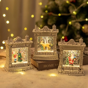Christmas fireplace snow globe lanterns with warm LED lights and holiday scenes