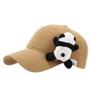 Khaki canvas baseball cap with cute panda plush toy decor and white brand tag side view