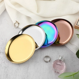 Set of four nordic round stainless steel trays in gold silver rose gold and rainbow colors