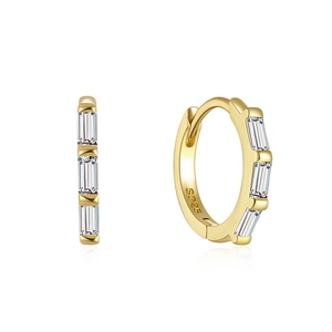 Detail view of gold S925 sterling silver hoop earrings with clear rectangular stones