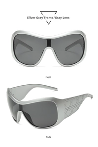 Detail of silver gray shield sunglasses with distinctive geometric cannage pattern on temples