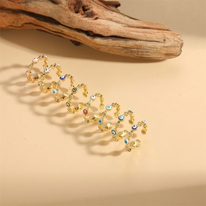 14K gold plated snake ring featuring colorful evil eye patterns and sparkling gems