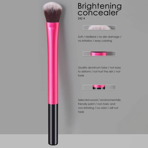 Detail view of pink brightening concealer brush #242 with wooden handle and aluminum tube