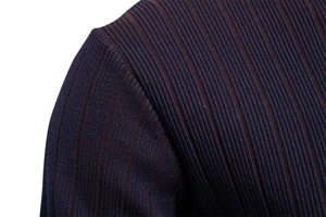 Detail shot of navy and dark red striped high-density knit fabric with shoulder stitching
