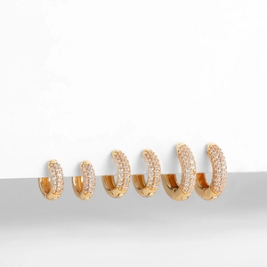 Three pairs of varying size 18K gold plated hoop earrings with pavé set cubic zirconia